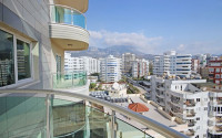 Bright three-room apartment on the 10th floor of a residential complex, Mahmutlar, Alanya-id-3378-photo-5