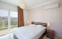 Bright three-room apartment on the 10th floor of a residential complex, Mahmutlar, Alanya-id-3378-photo-11
