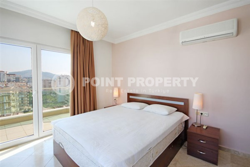 Bright three-room apartment on the 10th floor of a residential complex, Mahmutlar, Alanya-id-3378-photo-11