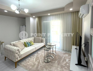 Elegant 1+1 apartment with an area of 55 m2, in the city of Gazipasa-id-3381-photo-1