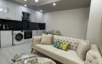 Elegant 1+1 apartment with an area of 55 m2, in the city of Gazipasa-id-3381-photo-2