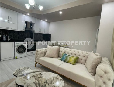 Elegant 1+1 apartment with an area of 55 m2, in the city of Gazipasa-id-3381-photo-2