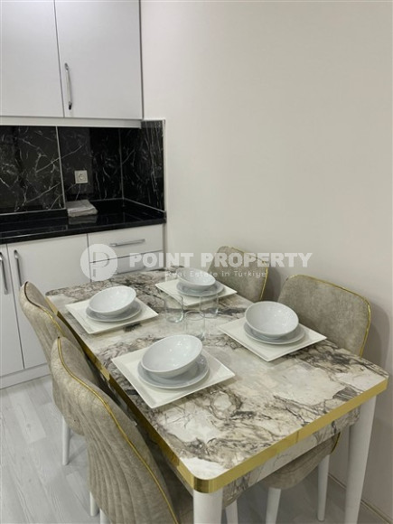 Elegant 1+1 apartment with an area of 55 m2, in the city of Gazipasa-id-3381-photo-7