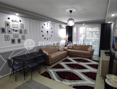 Stylish 1+1 apartment with furniture and designer renovation, Mahmutlar, Alanya-id-3392-photo-1