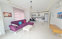 Bright 1+1 apartment with an area of 75 m² in a residential complex by the sea, Mahmutlar, Alanya-id-3393-photo-1