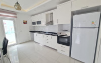 Bright 1+1 apartment with an area of 75 m² in a residential complex by the sea, Mahmutlar, Alanya-id-3393-photo-2