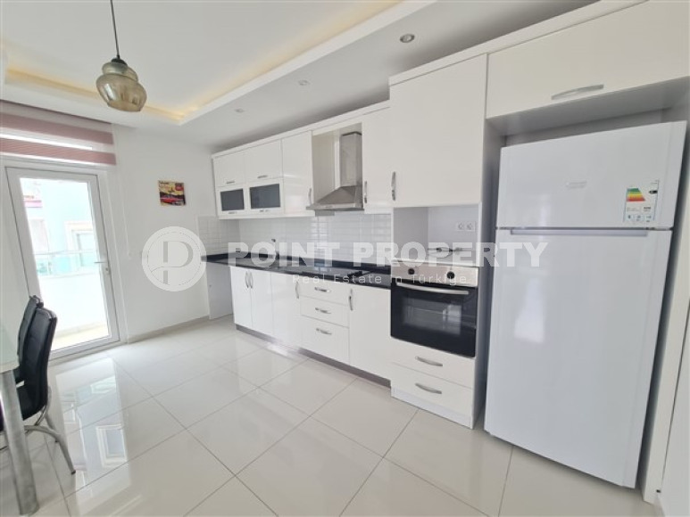 Bright 1+1 apartment with an area of 75 m² in a residential complex by the sea, Mahmutlar, Alanya-id-3393-photo-2