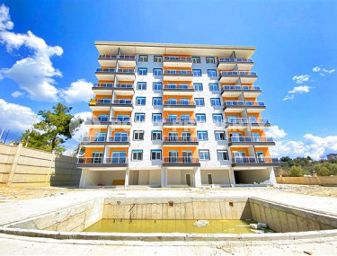 Новые апартаменты 1+1 стандартной площади 60 м² в жилом комплексе Авсаллара, Аланья-id-3396-фото-1