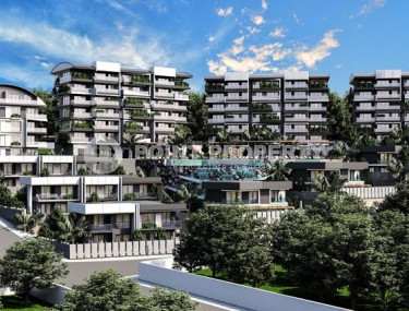 Новый крупный проект с квартирами и виллами от 63 до 425 м2, с видом на море в районе Каргыджак.-id-1301-фото-1