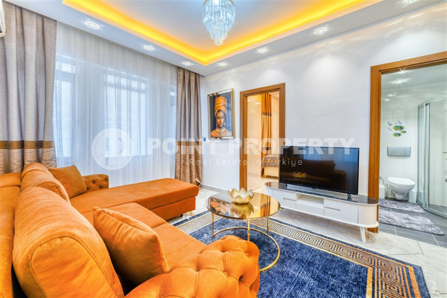 Standard apartment 1+1 with an area of 55 m² 50 meters from the beach, center, Alanya-id-3408-photo-2