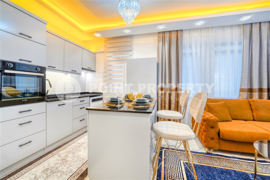 Standard apartment 1+1 with an area of 55 m² 50 meters from the beach, center, Alanya-id-3408-photo-3