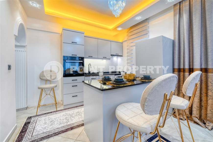 Standard apartment 1+1 with an area of 55 m² 50 meters from the beach, center, Alanya-id-3408-photo-5