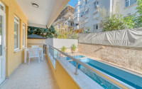 Standard apartment 1+1 with an area of 55 m² 50 meters from the beach, center, Alanya-id-3408-photo-12