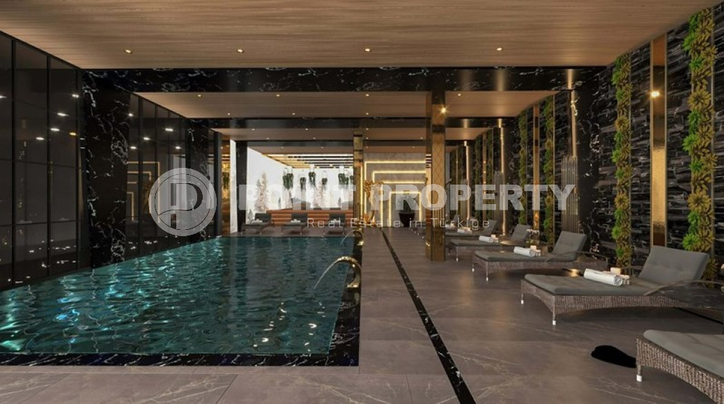 Новый крупный проект с квартирами и виллами от 63 до 425 м2, с видом на море в районе Каргыджак.-id-1301-фото-17