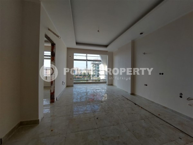 Apartment 1+1 and 60 m2 in a high-rise building under construction, Mahmutlar district, 100 meters from the center-id-3413-photo-4