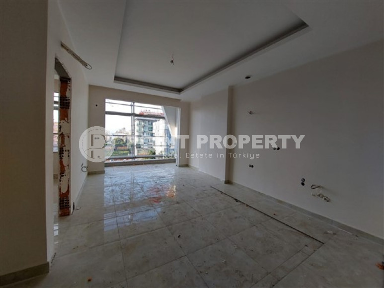 Apartment 1+1 and 60 m2 in a high-rise building under construction, Mahmutlar district, 100 meters from the center-id-3413-photo-5