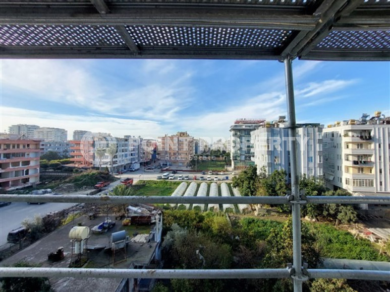 Apartment 1+1 and 60 m2 in a high-rise building under construction, Mahmutlar district, 100 meters from the center-id-3413-photo-11