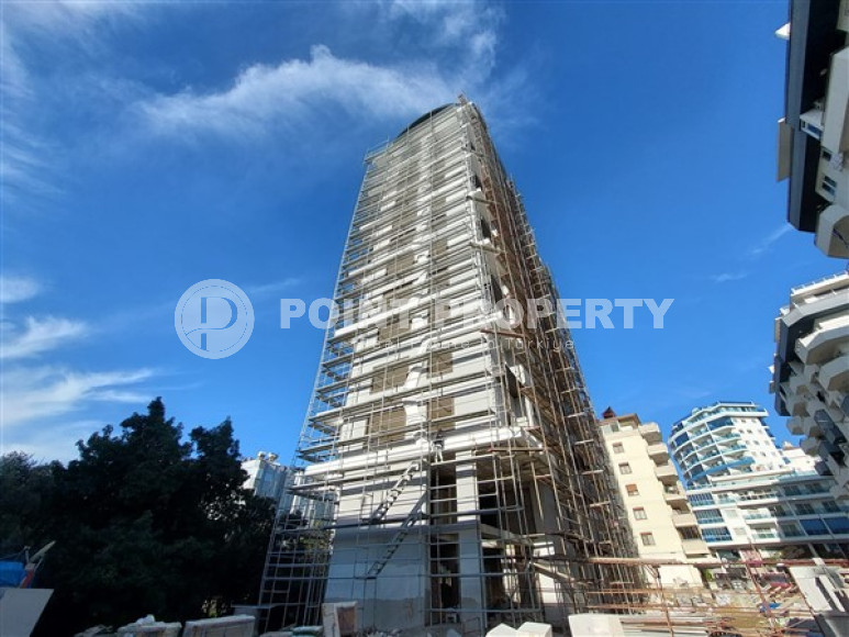 Apartment 1+1 and 60 m2 in a high-rise building under construction, Mahmutlar district, 100 meters from the center-id-3413-photo-13