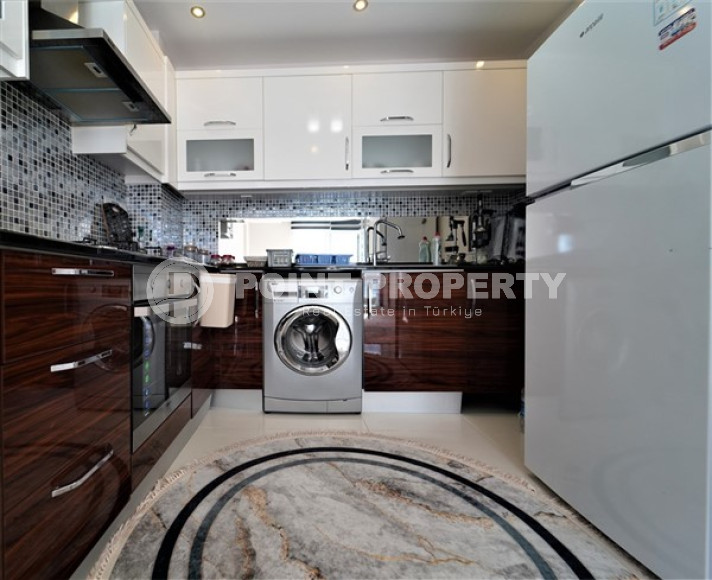 Inexpensive two-room apartment 65 m2 with furniture, Mahmutlar district-id-3414-photo-3