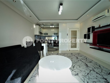 Inexpensive two-room apartment 65 m2 with furniture, Mahmutlar district-id-3414-photo-4