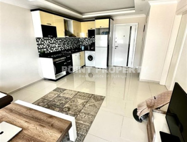 Небольшая двухкомнатная квартира 60 м2 на первом этаже дома, центр Аланьи-id-3415-фото-4