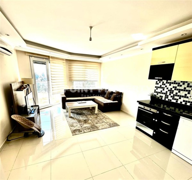 Небольшая двухкомнатная квартира 60 м2 на первом этаже дома, центр Аланьи-id-3415-фото-5