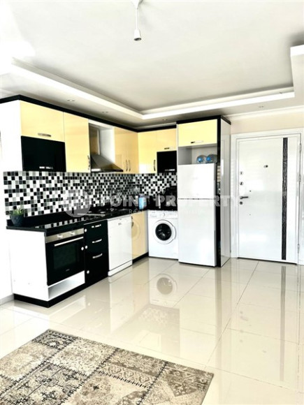 Небольшая двухкомнатная квартира 60 м2 на первом этаже дома, центр Аланьи-id-3415-фото-6