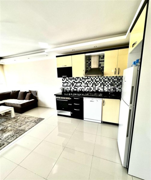 Небольшая двухкомнатная квартира 60 м2 на первом этаже дома, центр Аланьи-id-3415-фото-7