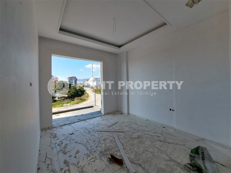 Уютные апартаменты 1+1 в строящемся пятиэтажном комплексе, район Кестель, 50 метров до моря-id-3432-фото-11