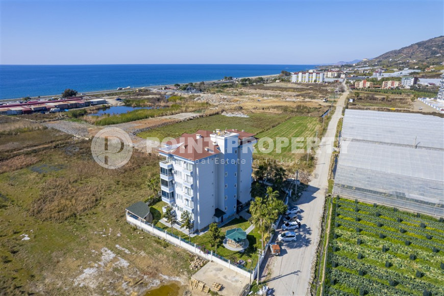 Изысканная двухкомнатная квартира 60 м2 в районе Демирташ, в 50 метрах от моря-id-3436-фото-21