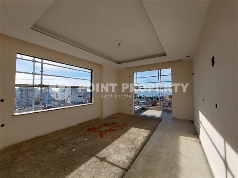 Апартаменты 2+1 с площадью 105 м2 в строящейся резиденции, район Махмутлар-id-3439-фото-4