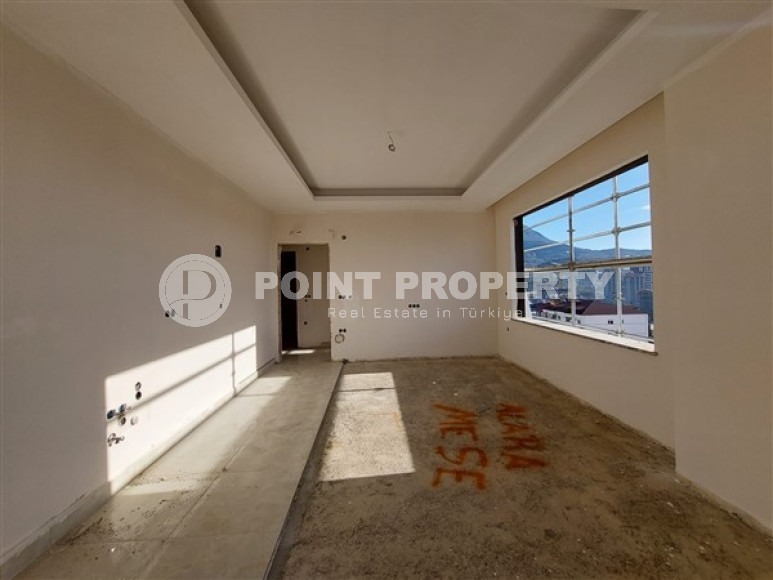 Апартаменты 2+1 с площадью 105 м2 в строящейся резиденции, район Махмутлар-id-3439-фото-5