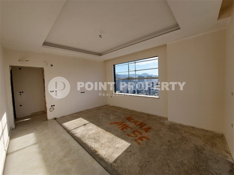 Апартаменты 2+1 с площадью 105 м2 в строящейся резиденции, район Махмутлар-id-3439-фото-6