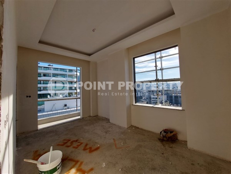 Апартаменты 2+1 с площадью 105 м2 в строящейся резиденции, район Махмутлар-id-3439-фото-8