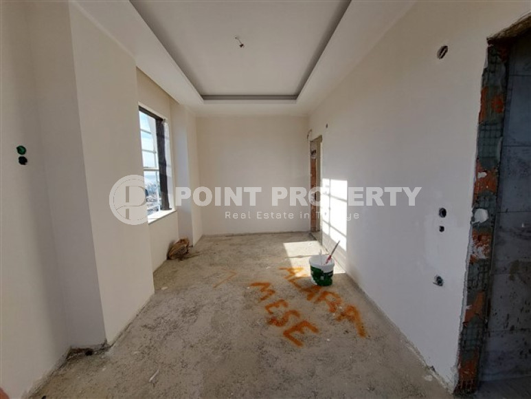 Апартаменты 2+1 с площадью 105 м2 в строящейся резиденции, район Махмутлар-id-3439-фото-9