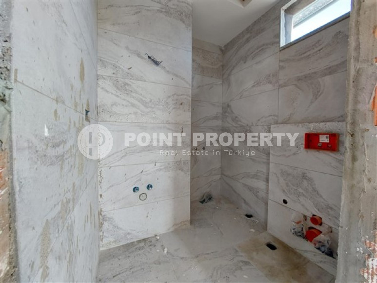 Апартаменты 2+1 с площадью 105 м2 в строящейся резиденции, район Махмутлар-id-3439-фото-10