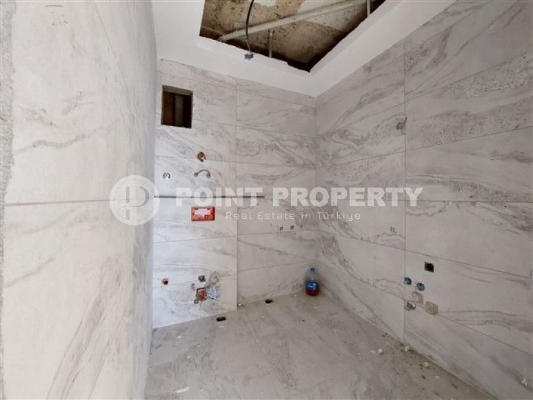 Апартаменты 2+1 с площадью 105 м2 в строящейся резиденции, район Махмутлар-id-3439-фото-11