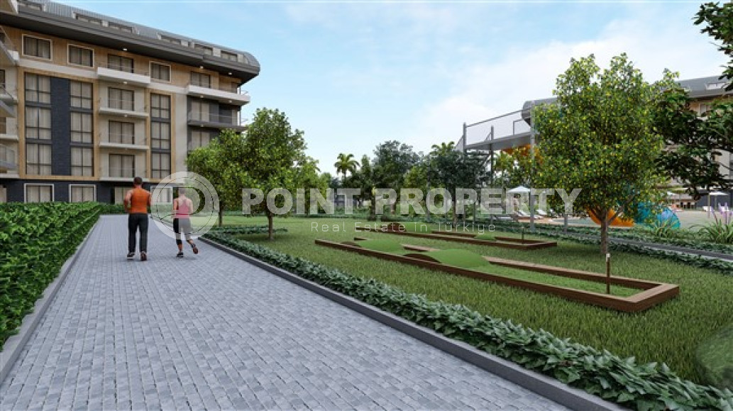 Небольшая квартира 1+1 с площадью 52 м2 в строящемся комплексе, район Оба-id-3443-фото-12