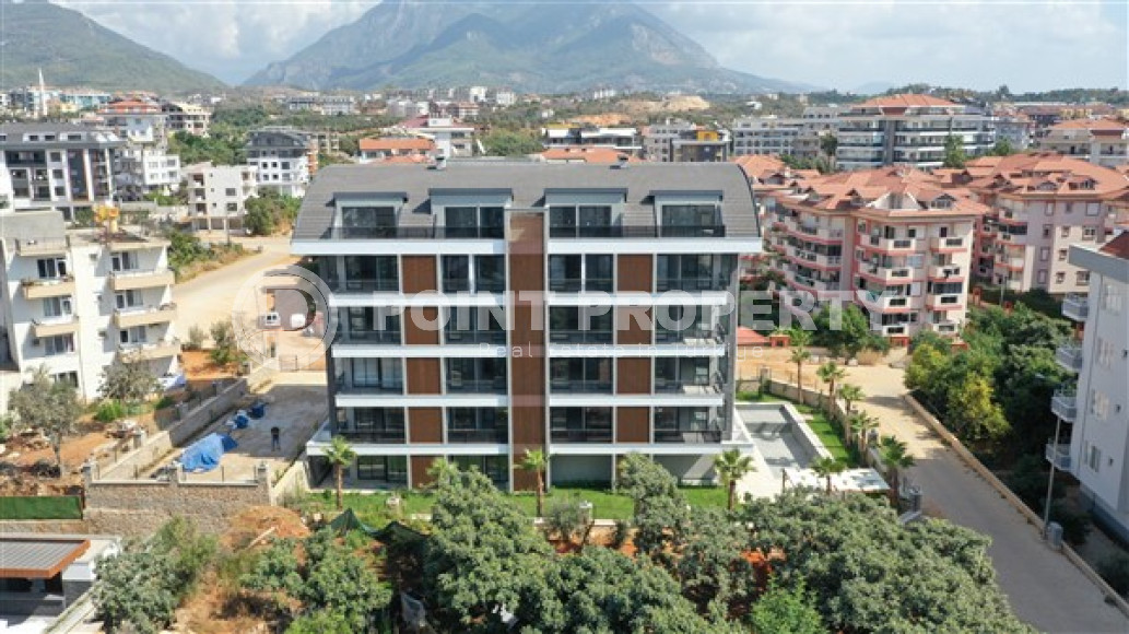 Spacious apartment with a 2+1 layout in a building built in 2022, Oba district-id-3448-photo-3