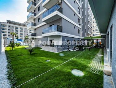 Апартаменты с площадью 61 м2 в резиденции 2021 года постройки, район Махмутлар-id-3457-фото-4