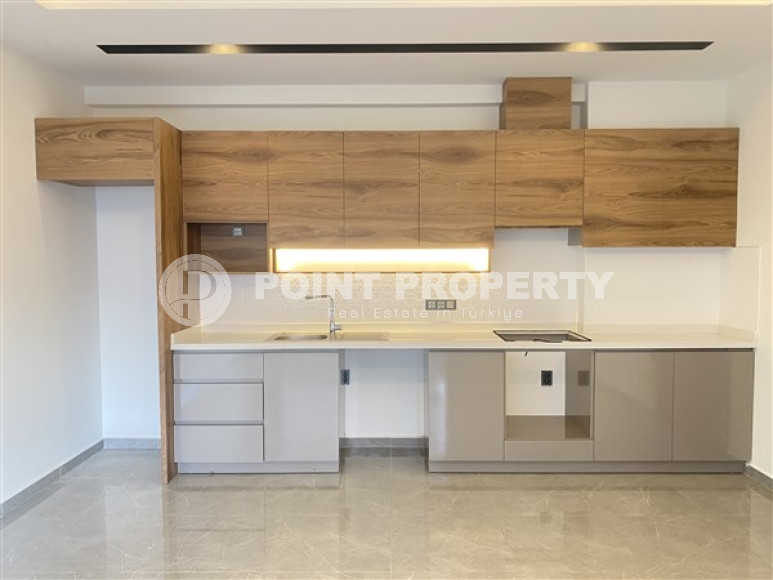 Апартаменты с площадью 61 м2 в резиденции 2021 года постройки, район Махмутлар-id-3457-фото-7