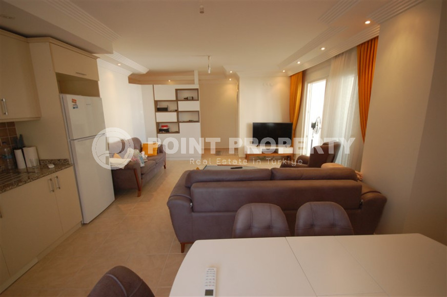 Three-room apartment with a swimming pool in the lower part of the Oba district, 75 m2-id-1305-photo-3