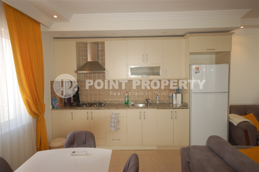 Three-room apartment with a swimming pool in the lower part of the Oba district, 75 m2-id-1305-photo-5