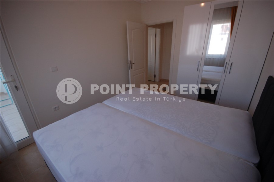 Three-room apartment with a swimming pool in the lower part of the Oba district, 75 m2-id-1305-photo-13