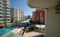 Three-room apartment with a swimming pool in the lower part of the Oba district, 75 m2-id-1305-photo-16