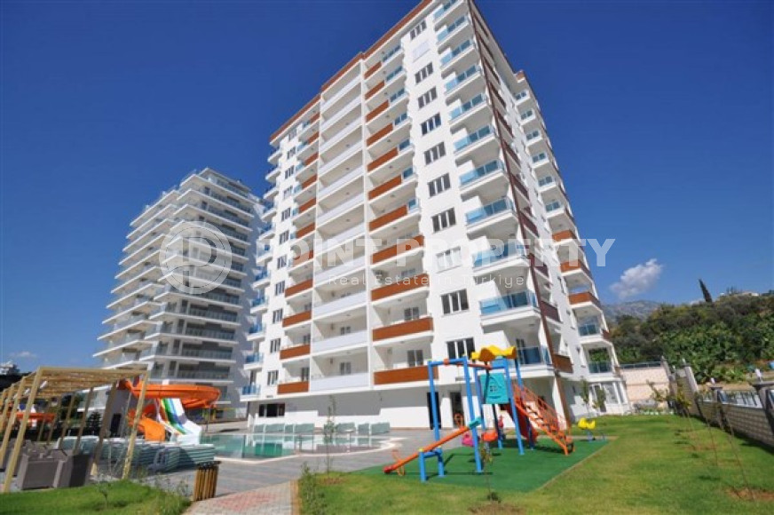 Современные апартаменты с планировкой 2+1 в резиденции 2019 года, район Махмутлар-id-3467-фото-2