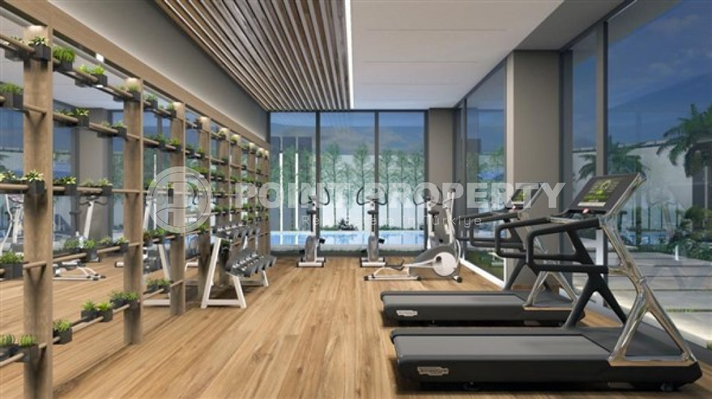 Недорогие апартаменты 50 м2 в строящемся малоэтажном комплексе, район Махмутлар-id-3468-фото-3