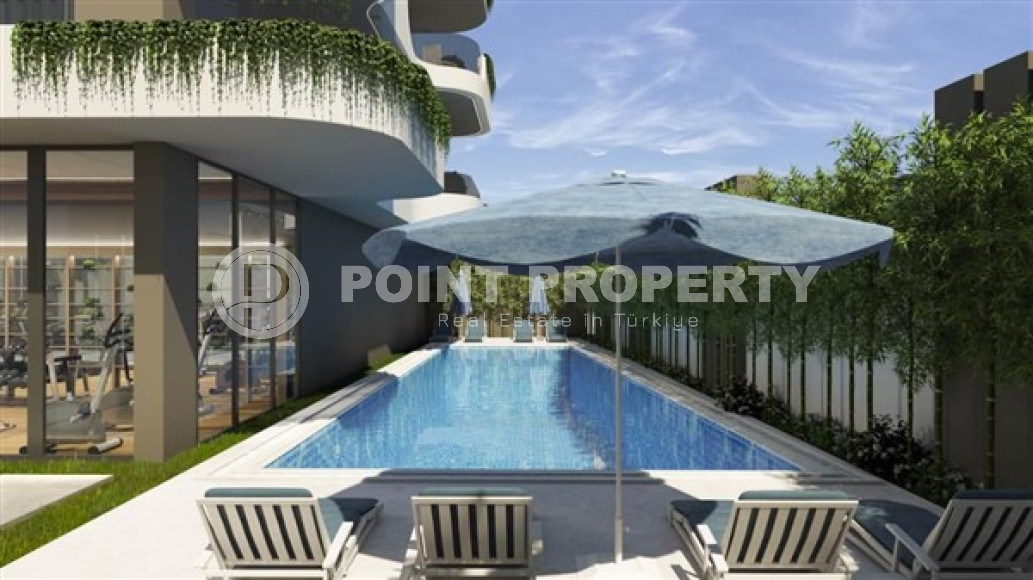 Недорогие апартаменты 50 м2 в строящемся малоэтажном комплексе, район Махмутлар-id-3468-фото-9