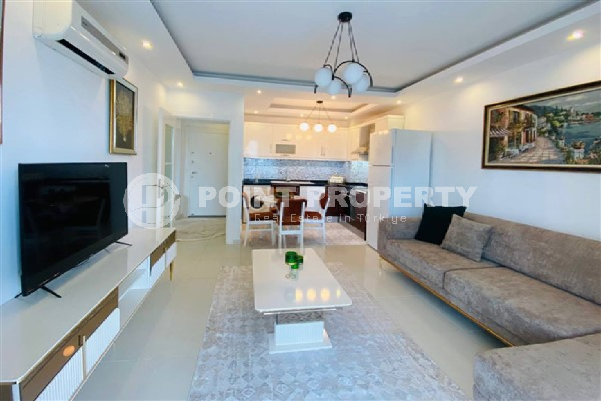 Современные апартаменты 1+1 с площадью 65 м2 в районе Махмутлар, с мебелью-id-3473-фото-2