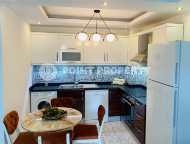 Modern 1+1 apartment with an area of 65 m2 in the Mahmutlar area, furnished-id-3473-photo-3